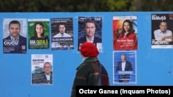 Afișe electorale cu o parte dintre candidații pentru alegerile parțiale din București, de pe 7 decembrie. 