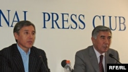 Party leaders Bolat Abilov (left) and Zharmakhan Tuyaqbay