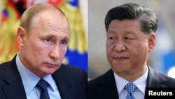 Лідер Комуністичної партії Китаю Сі Цзіньпін (ліворуч) сказав Путіну, що Пекін і Москва повинні докладати більше спільних зусиль для захисту інтересів безпеки один одного