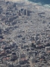 Pogled iz jordanskog vojnog aviona prikazuje Pojas Gaze, neposredno prije bacanja humanitarne pomoći, 17. augusta 2025.<br>