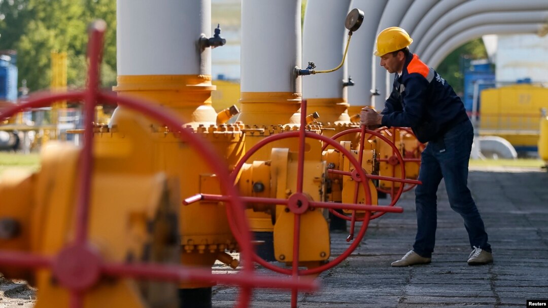 A worker turns a valve at an underground gas storage facility near Stryi, Ukraine.