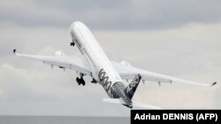 Airbus A350-1000 XWB, la un show-ul aviatic de lângă Londra, iulie 2018.