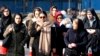 IRAN -- Iranian women wearing hijab walk down a street in the capital Tehran, February 7, 2018