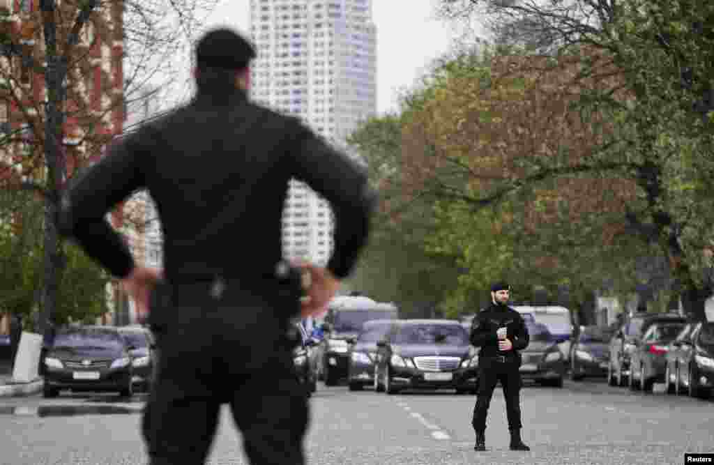 Special forces stand guard during a government-organized event marking Chechen Language Day.