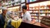 Iranians shop at a drugstore at the Nikan hospital in Tehran on September 11, 2018. - Judges at the International Court of Justice in The Hague unanimously ruled Washington should remove barriers to "the free exportation to Iran of medicines and medical d