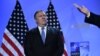 BELGIUM -- U.S. Secretary of State Mike Pompeo (L) looks on as US. President Donald Trump addresses a press conference on the second day of the NATO summit in Brussels, July 12, 2018