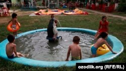 Uzbekistan - uzbek children are swimming in the pool