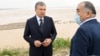 After the May 1 collapse of the dam, Uzbek President Shavkat Mirziyoev (left) was accompanied at the scene by a wealthy senator, Abdughani Sanginov, who was involved in the construction of the project. 
