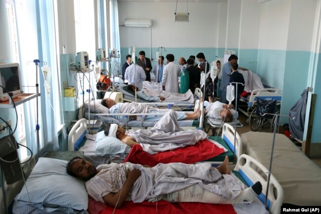 Wounded people receive treatment in a hospital after the blast in Kabul on July 1.