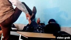 Iran -- video grab of alleged student hitting in a school in the city of Aligoodarz, undated.
