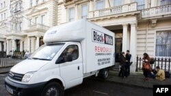 Iranian diplomats pack up after being expelled from Britain in response to attack on British compounds in Tehran.