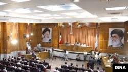 The mass trials of government critics accused of crimes against the state continued in Tehran on September 14.