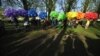 Activists prepare to release balloons during the &quot;Rainbow flashmob&quot; organized at Petrovsky Ostrov Park on International Day Against Homophobia in St. Petersburg on May 17. (ITAR-TASS)