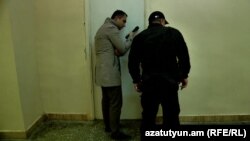 Armenia - RFE/RL Armenian Service reporter Karlen Aslanian interviews David Petrosian who together with four other protesters went on a hunger strike inside a locked lecture room of Yerevan State University, 14Nov, 2017