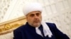 Azerbaijan = Sheikh-ul-Islam Allahshukur Pashazade looks on during a meeting with Pope Francis at the Heydar Mosque in Baku, October 2, 2016.
