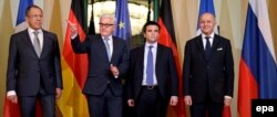 German Foreign Minister Frank-Walter Steinmeier, (2nd left) welcomes his counterparts from France, Laurent Fabius, (right); Russia, Sergei Lavrov, (L); and Ukraine, Pavlo Klimkin in Berlin in January 2015.