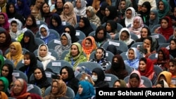 Afghan women "must be able to meaningfully participate in decisions" affecting them, an activist says. (file photo)