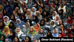 FILE: Afghan women attend a consultative grand assembly or Loya Jirga in Kabul in April 2019.