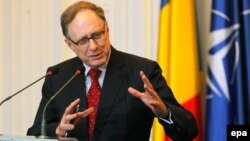 Then-NATO Deputy Secretary-General Alexander Vershbow gestures during a press conference in Bucharest in 2016.
