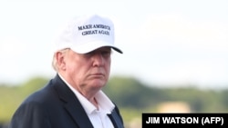 US - US President Donald Trump prepares to board Air Force One