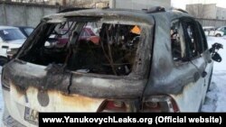 The burned-out car of an Automaidan activist from a blacklist belonging to Yanukovych's bodyguard, Konstantyn Kobzar.