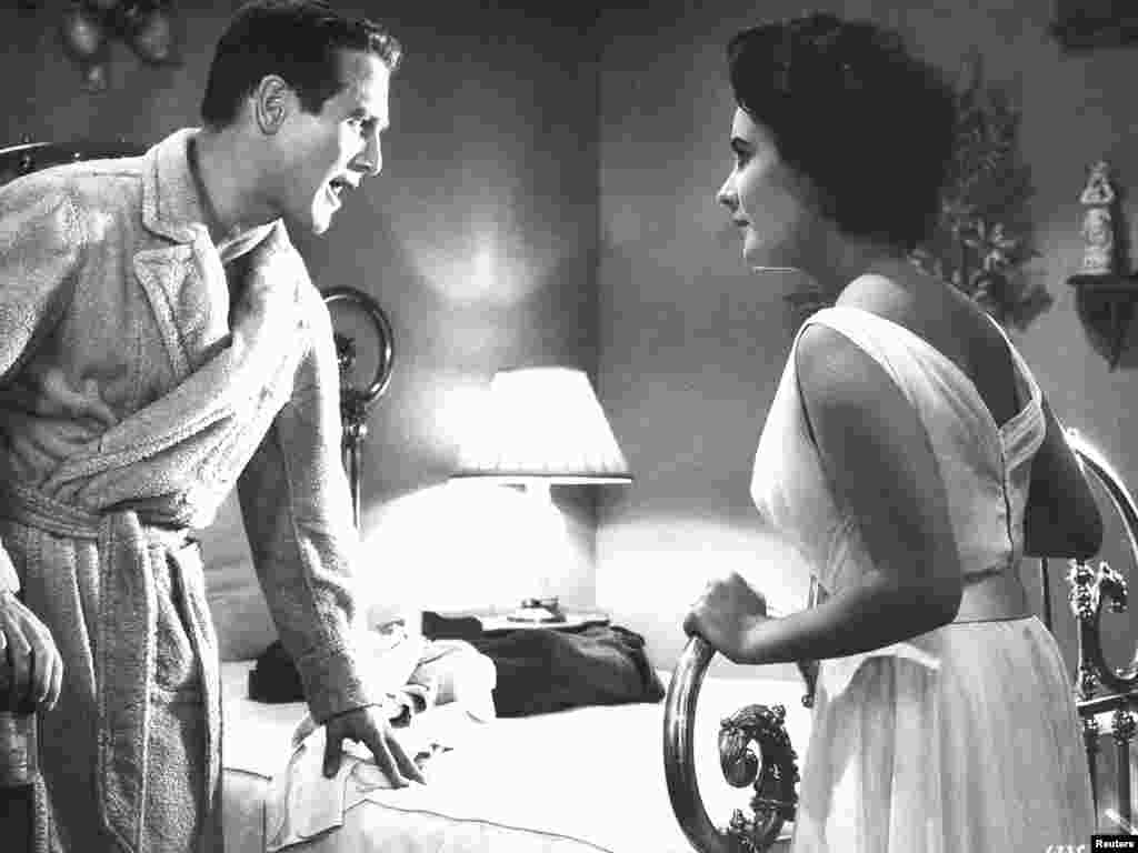 Paul Newman și Elizabeth Taylor în filmul "Cat On A Hot Tin Roof” (1958) - REUTERS/Handout