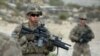 FILE: U.S. soldiers patrol during a month-long anti-Taliban operation by the Afghan National Army.