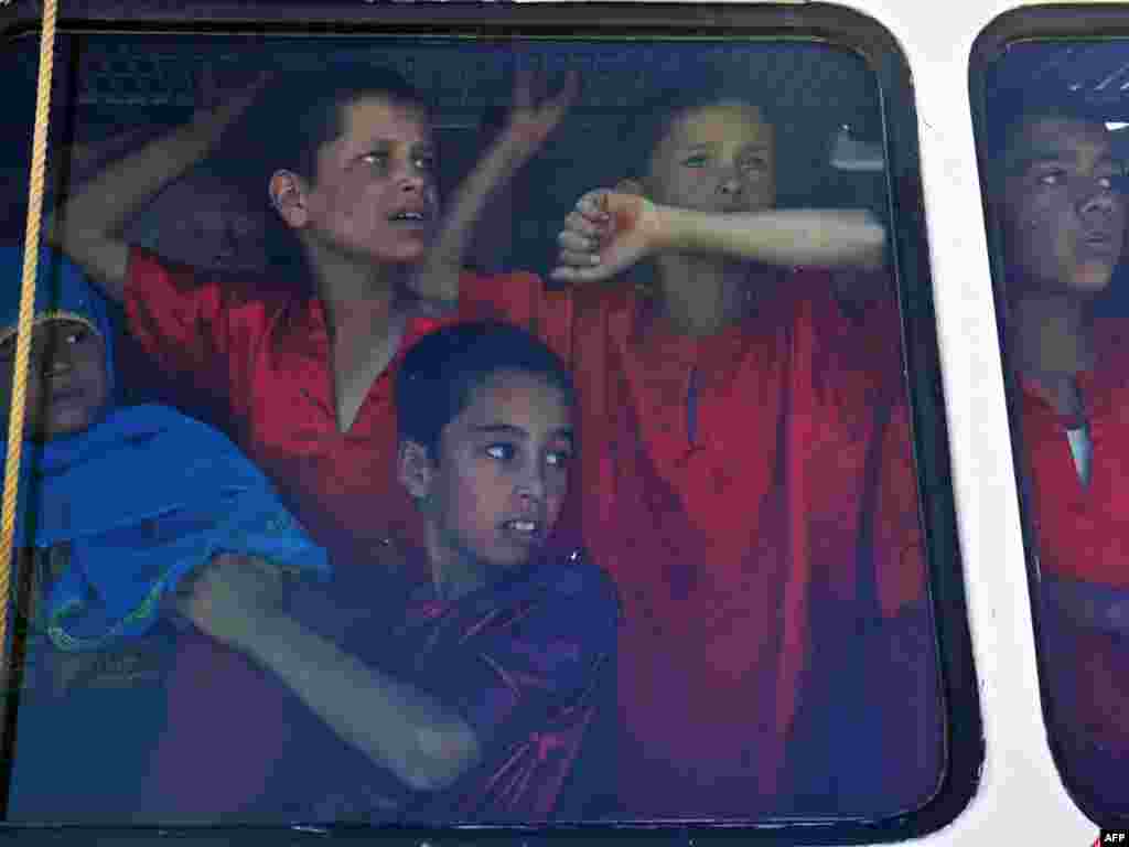 Children arrive for an International Peace Day ceremony. Photo by AFP - A recent Durham University survey shows that over one in five children in parts of Afghanistan suffer from some kind of psychiatric disorder, with girls twice as likely to be diagnosed.