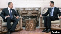 რუსეთის საგარეო საქმეთა მინისტრი სერგეი ლავროვი და სირიის პრეზიდენტი ბაშარ ალ-ასადი