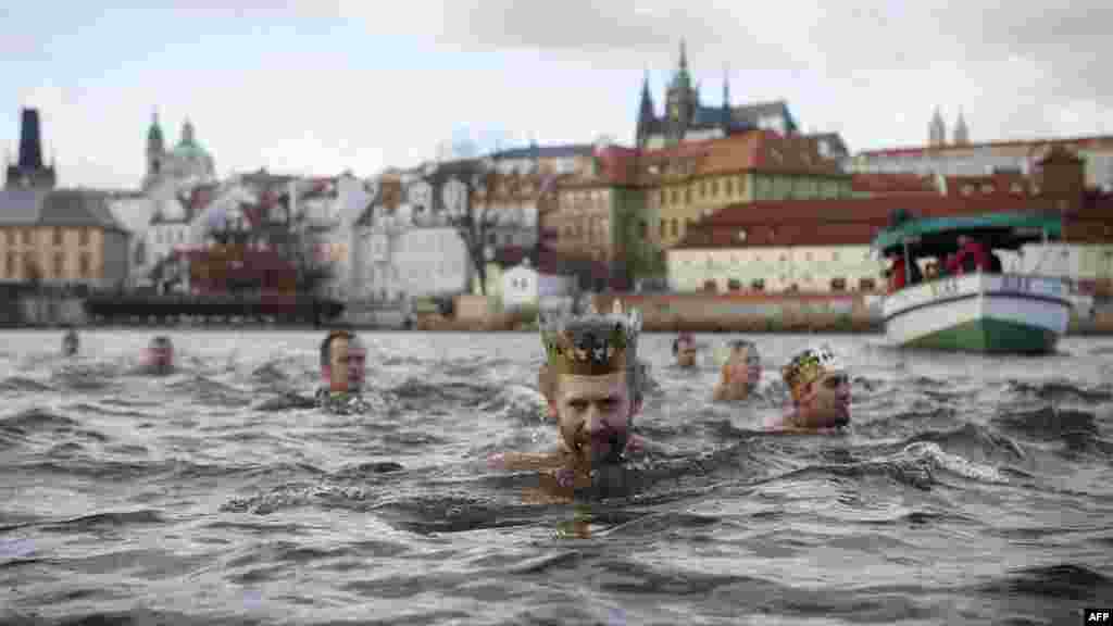 Polar swimmers take part at the New Year swim in the Vltava River in Prague, Czech Republic. AFP PHOTO/MATEJ DIVAZNA