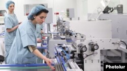 Armenia - Workers at a medical items factory in Yerevan recently set up by a Russian company, 14Mar2014. 