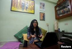 Actor Divya Unny gestures as she speaks inside her residence in Mumbai, India on November 11