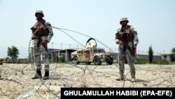 AFGHANISTAN -- Afghan security officials patrol on the outskirts of Jalalabad, Afghanistan, 16 July 2018. 