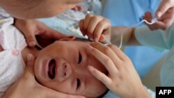 Keçən il Çində korlanmış süd məhsulları 6 uşağın ölümünə səbəb olub, 300 minə qədər uşaq xəstələnib