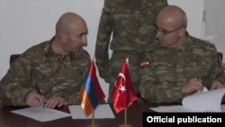 Turkey - Senior Armenian and Turkish army officers sign a protocol, 29Nov2012.