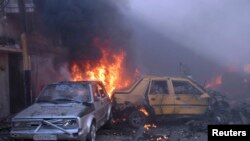 Pamje nga një eksplodim i makinës - bombë më herët këtë muaj në Homs