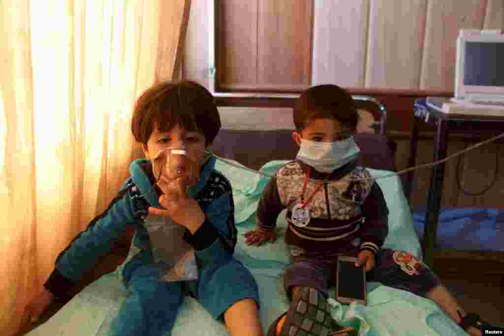 Children receive oxygen at a hospital in Taza, south of the Iraqi city of Kirkuk. Iraqi Kurdish officials accused Islamic State militants of using &ldquo;poisonous substances&rdquo; during shelling. The officials said an attack with mortar shells and Katyusha rockets filled with a chemical agent took place on March 8 in Taza, a mainly Shi&rsquo;ite Turkoman village about 20 kilometers south of Kirkuk.