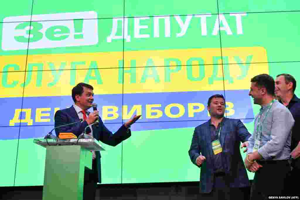 Dmytro Razumkov, head of president Volodymyr Zelenskiy's Servant of the People party, speaks at the party's election headquarters in Kyiv before answering questions from the press. (AFP/Genya Savilov)