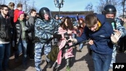 Police detained more than 1,000 people in Moscow alone over anticorruption rallies across Russia organized by opposition leader Aleksei Navalny on March 26. 