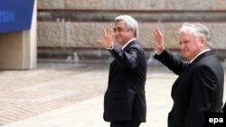 Poland -- Armenian President Serzh Sarkisian (L) and Armenian Foreign Minister Eduard Nalbandian arrive for the NATO Summit at the National Stadium in Warsaw, July 8, 2016