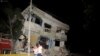 Residents walk on a street amid destroyed buildings following an earthquake on April 16 in Guayaquil, Ecuador. At least 28 people were killed by a strong 7.8-magnitude earthquake that struck the country&#39;s northwest. (AFP/Ariel Ochoa)