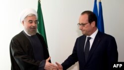 Presidenti iranian Hassan Rohani dhe ai francez Francois Hollande 