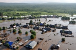 A village in southern Siberia inundated by a flash flood caused by heavy rains in June.