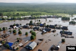 A village in southern Siberia inundated by a flash flood caused by heavy rains in June.