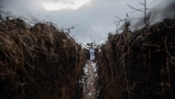 A Ukrainian soldier holds a position near the town of Zolote in the Luhansk region earlier this month.