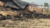 Charred bodies littered the scene after the tanker exploded.