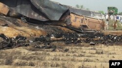 Charred bodies littered the scene after the tanker exploded.