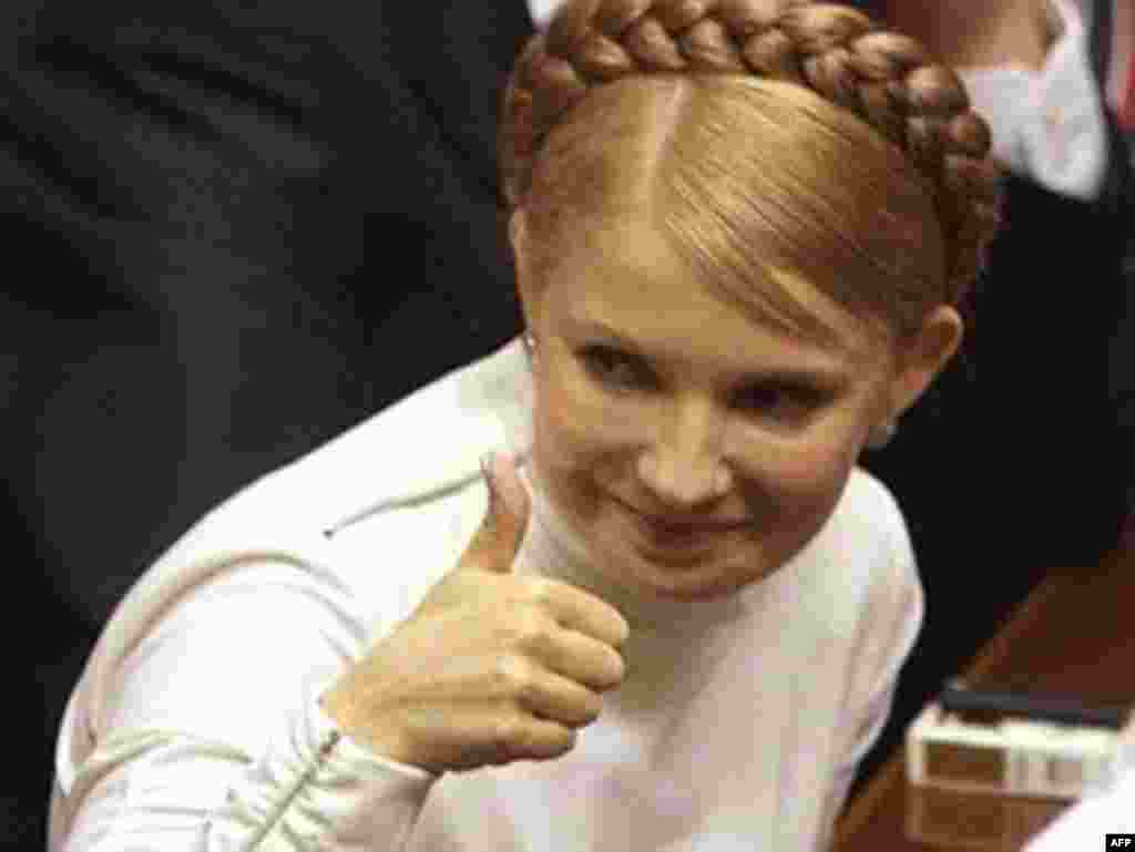Ukraine -- Yuliya Tymoshenko reacts during voting in the Parliament in Kyiv, 18Dec2007 - 18 грудня 2007, Юлія Тимошенко – новий Прем’єр-міністр України. «За» проголосували 226 депутатів від Коаліції демократичних сил. Волевиявлення депутатів було поіменним і відкритим, але не за допомогою системи «Рада», а через публічне проголошення кожним парламентарем своєї позиції