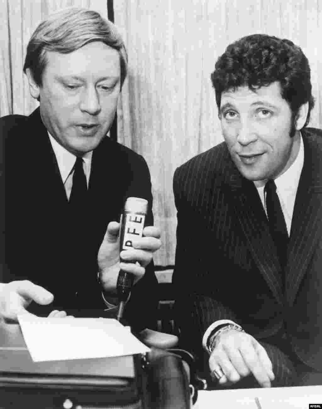 RFE Czechoslovak disc jockey Joe Sevecka (left) interviews British singing star Tom Jones during his March 1968 visit to Munich.