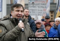 Former Georgian President and Odesa's ex-Governor Mikheil Saakashvili speaks to his supporters during a rally outside the Ukrainian parliament in Kyiv on November 7.